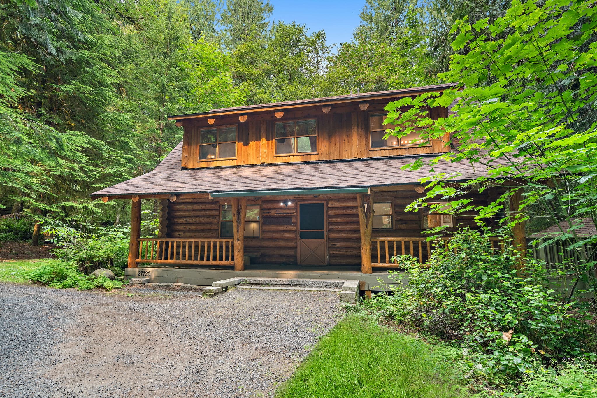 Front elevation with the full covered porch.
