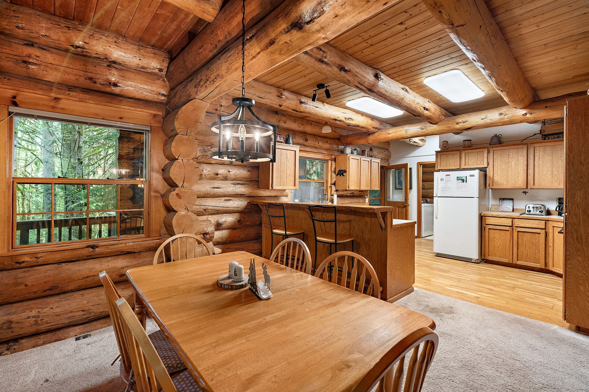 Dining and kitchen open to the living room.