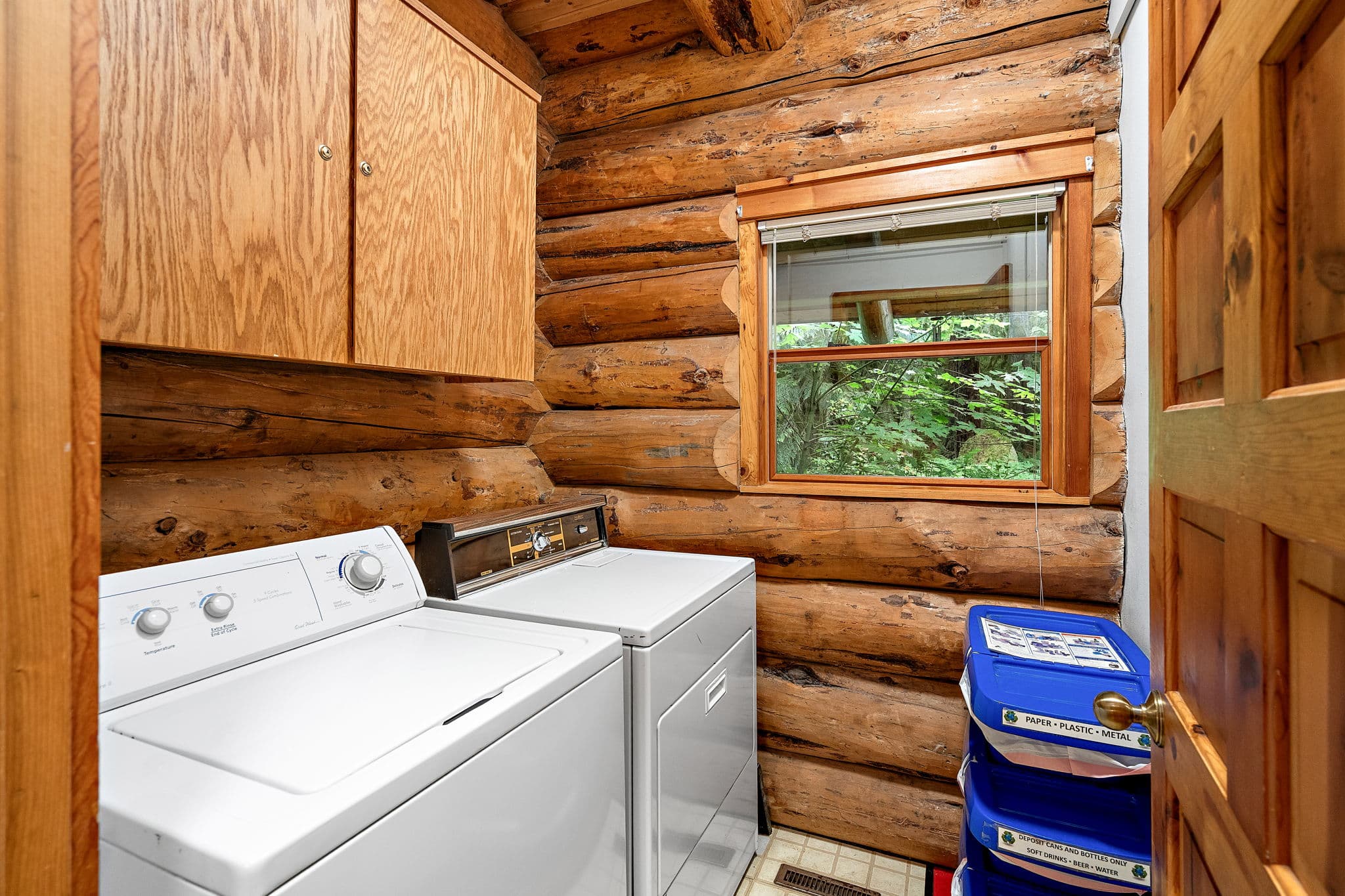 Washer and dryer in the laundry room.