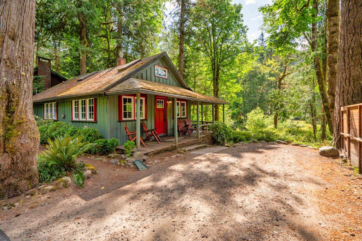 Exterior cabin view in the trees.