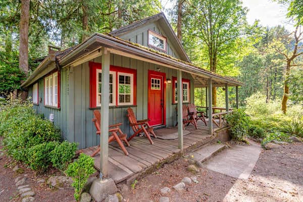 Exterior front porch and red door.