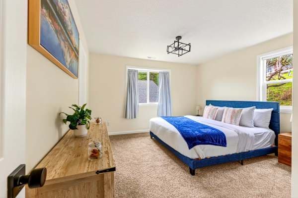 Primary bedroom: queen bed + ensuite bath
