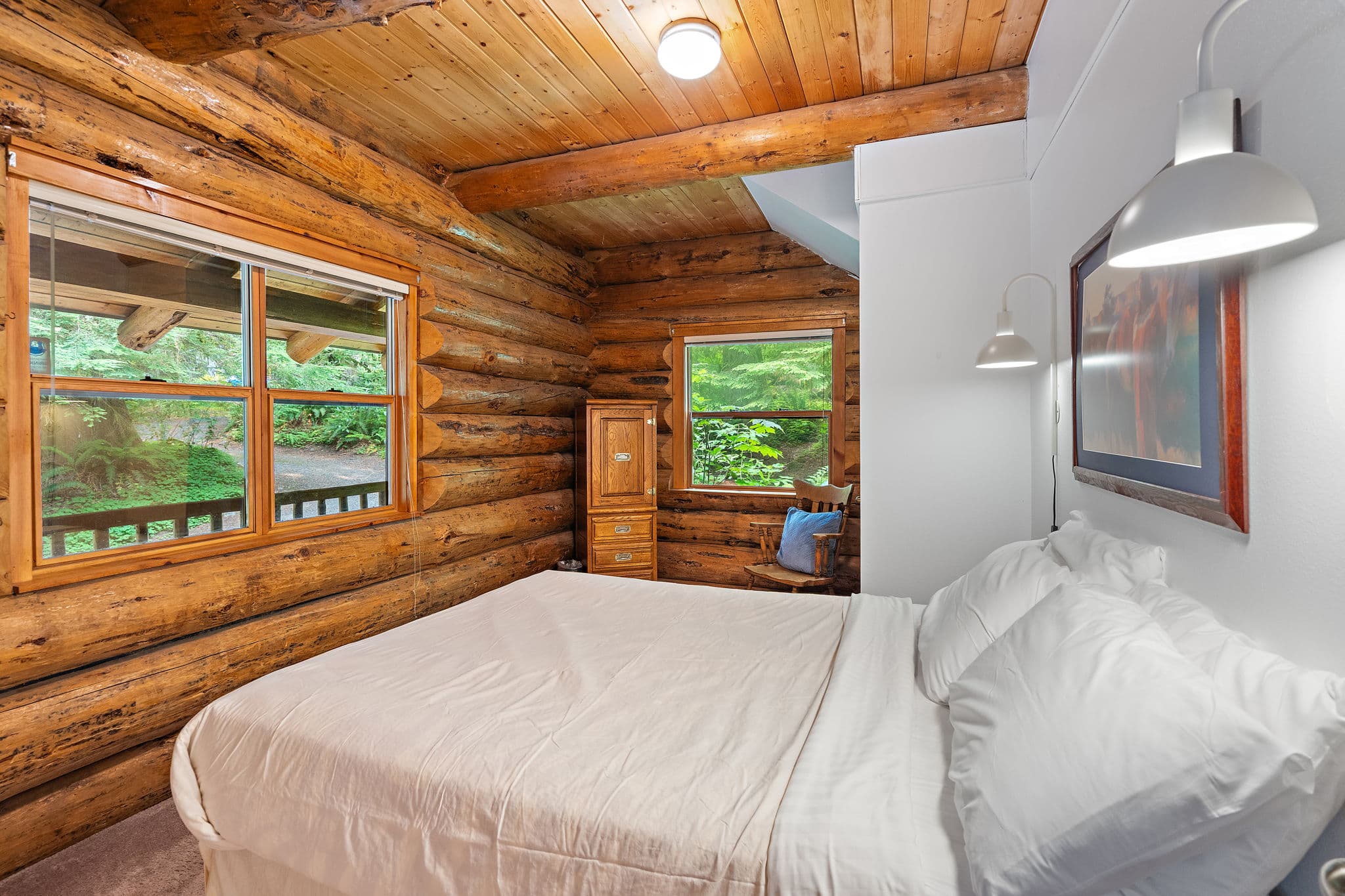 Main-floor bedroom with windows on two sides.